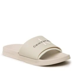 Mules / Sandales De Bain Calvin Klein Jeans Slide Monogram Tpu YM0YM00361 Ancient White/Eggshell 0K9